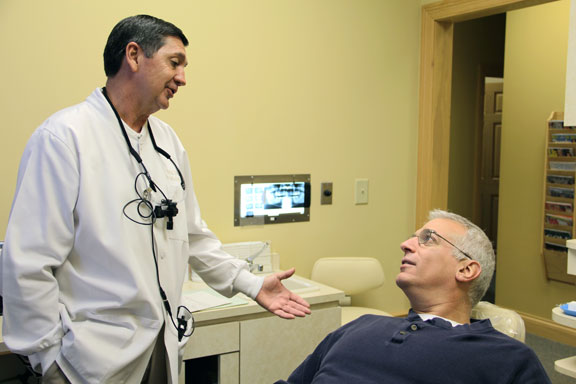 Dr Phil Gallagher, D.D.S. with patient